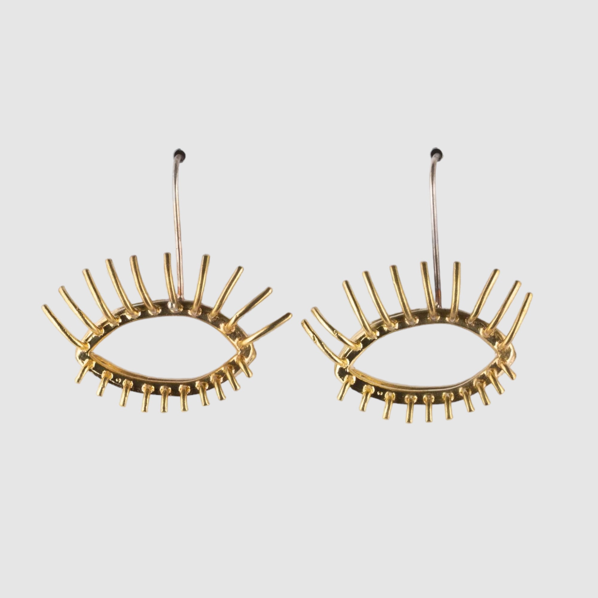 20/20 BRONZE EARRINGS with eyelashes, handmade by Sofie Albertsen in Tucson Arizona