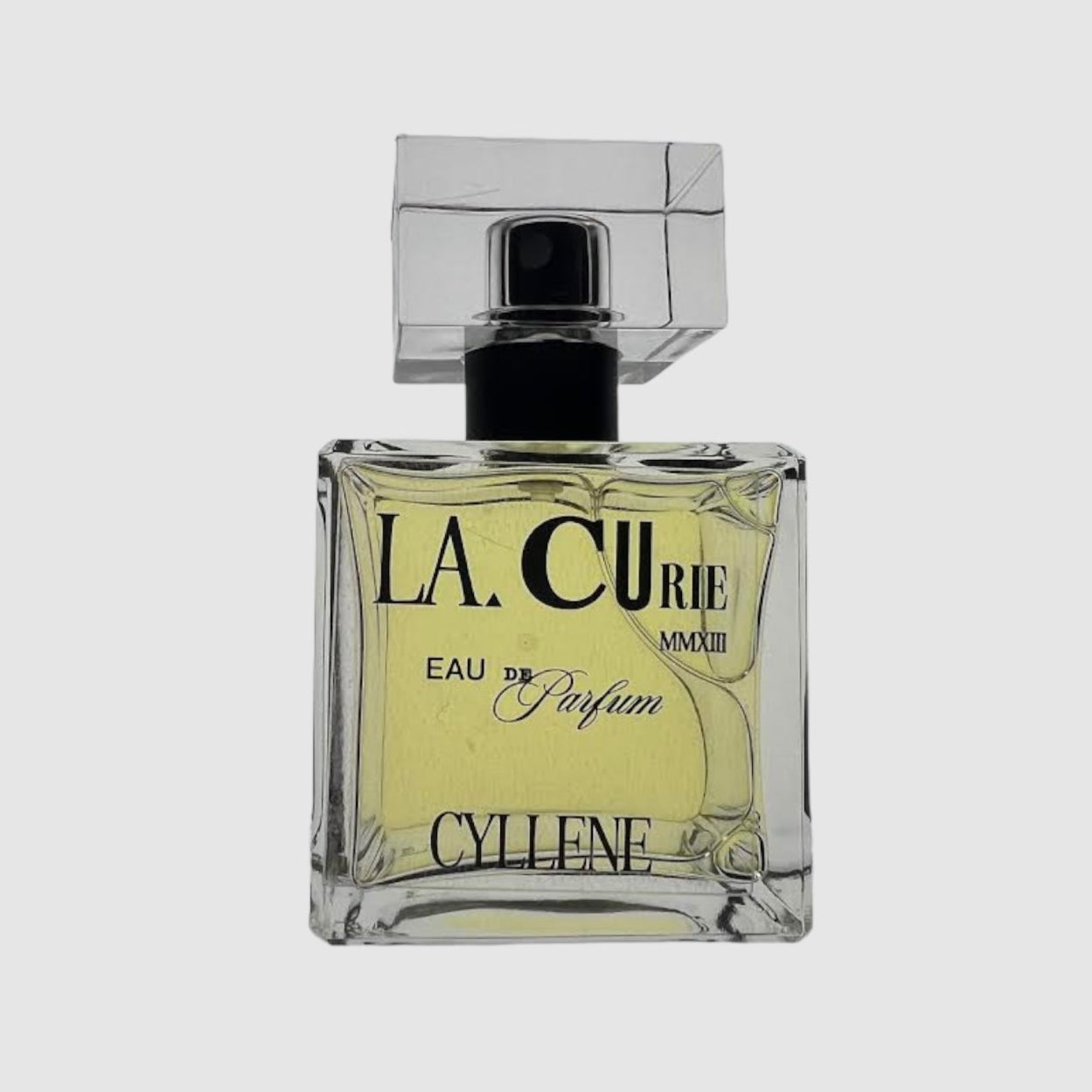 A square glass bottle of LA CURIE Eau de Parfum with a black cap and a label that reads 'CYLLENE'.
