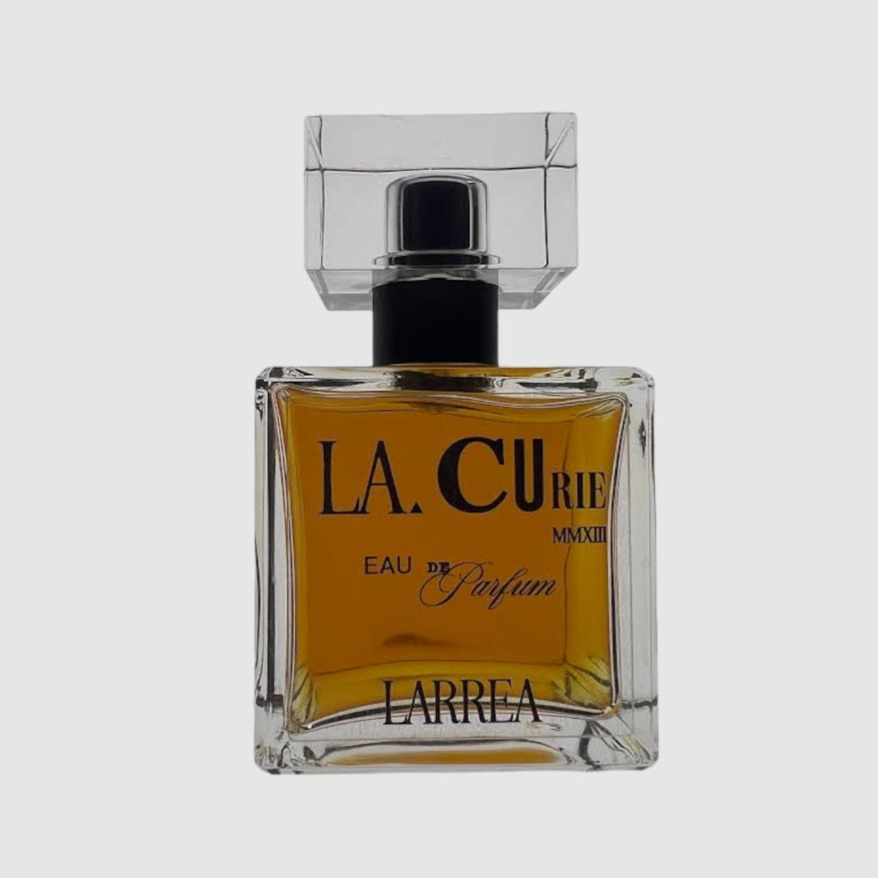 A square glass bottle of LA CURIE unisex eau de parfum with a black label and cap.