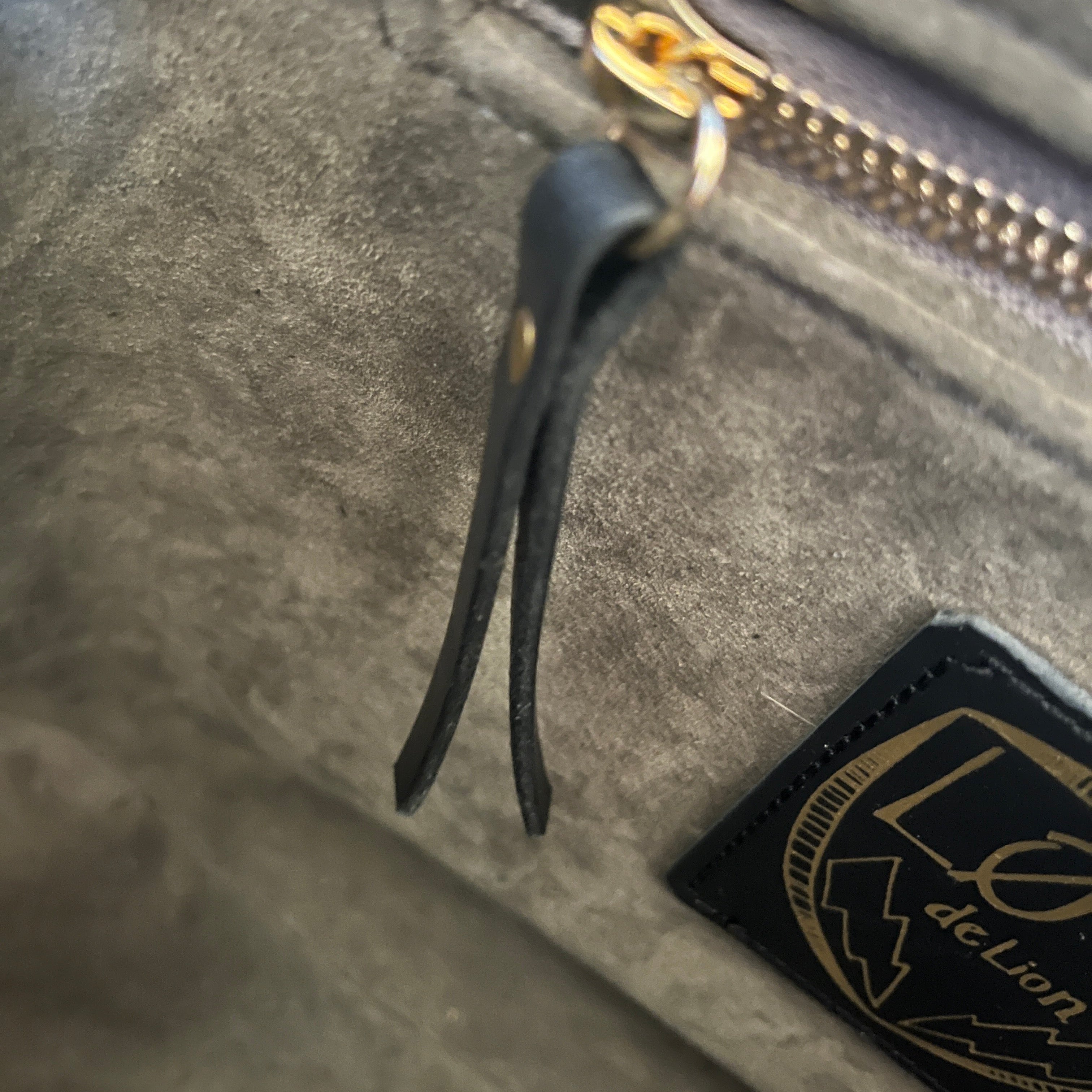 Interior detail shot of black leather Outsider Carry All by Mellow Dawm