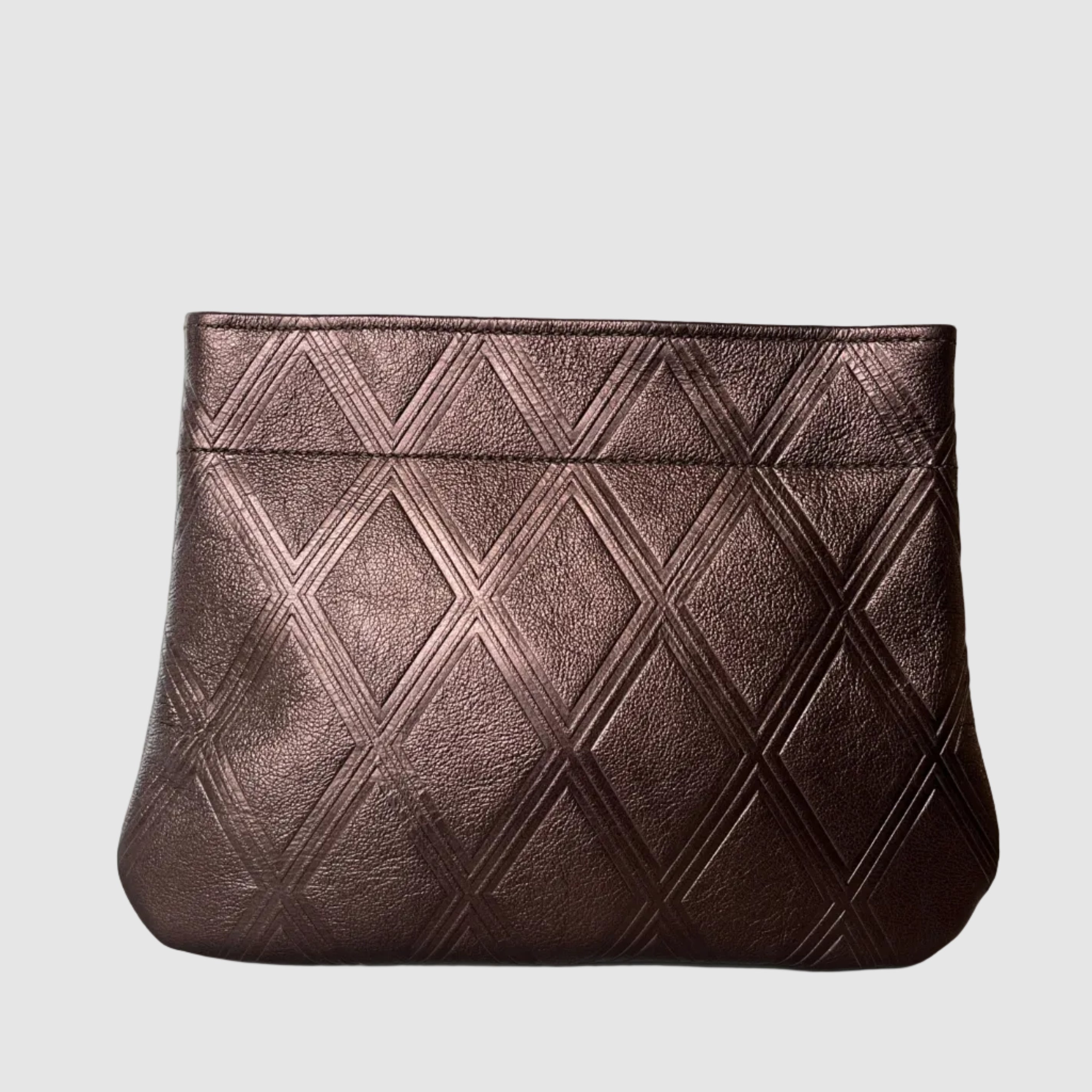 Medium sized clutch mellow dawn embossed diamond patterns quilted vibe independent hand made boutique