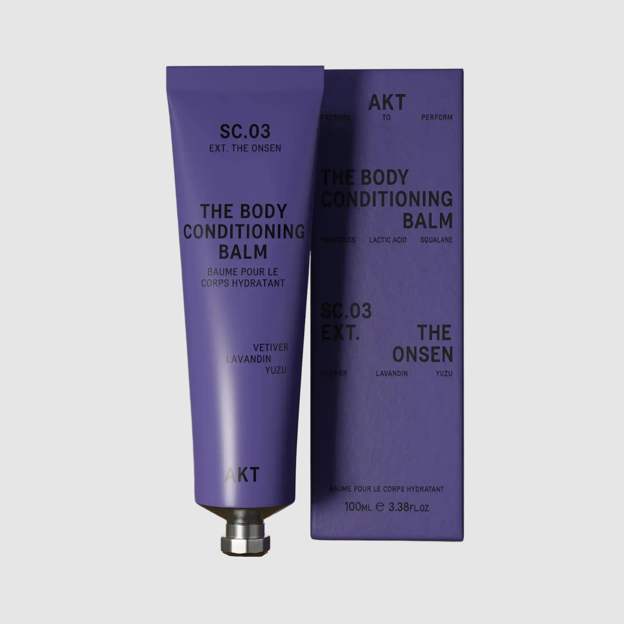 Two purple tubes of 'The Body Conditioning Balm' by KT on a light grey background
