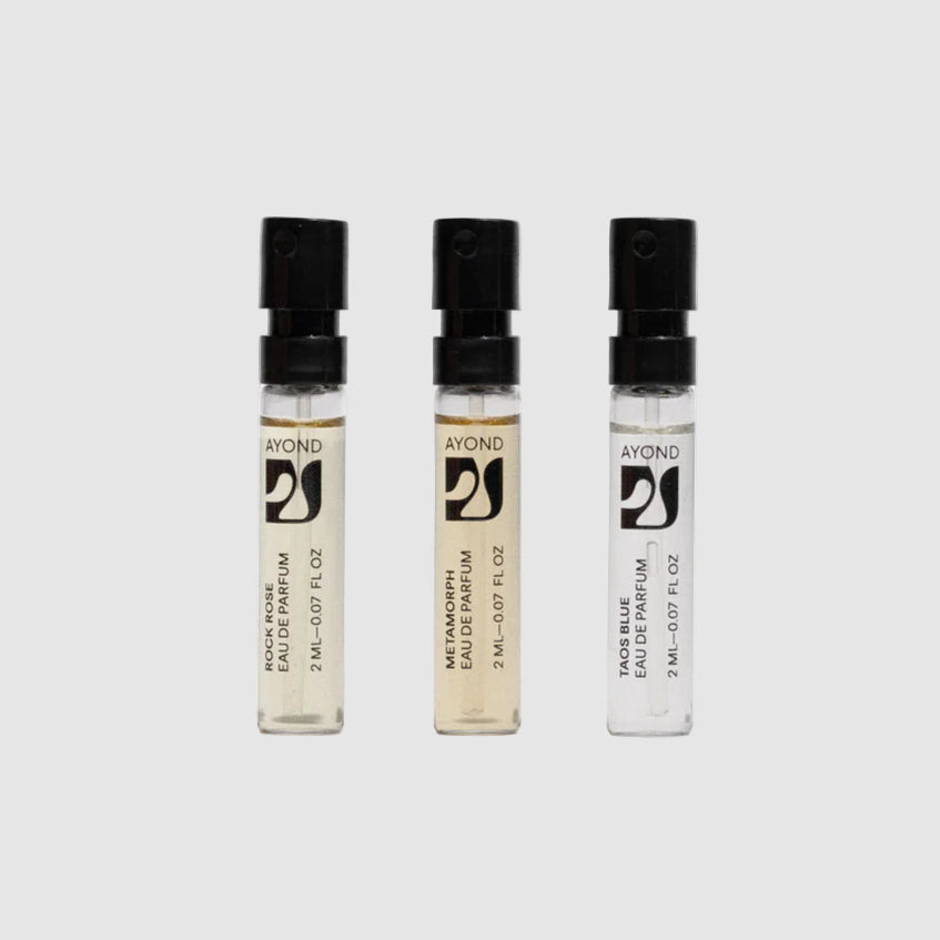 Ayond's Discovery Set of three small perfume samples - 2mL each with black caps on a light grey background