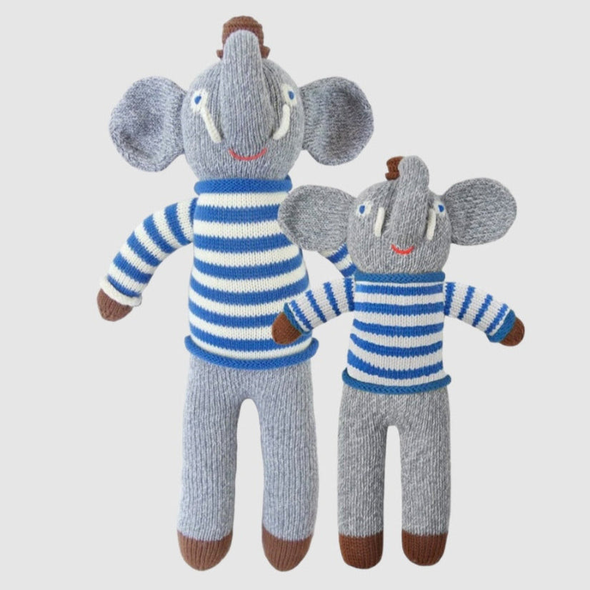 Two knit dolls designed to look like elephants, one larger and one smaller, both with blue and gray striped shirts.