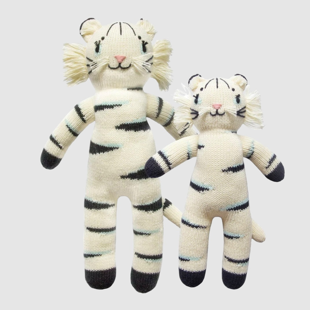 Two plush toy tigers with black and white stripes, larger and smaller sizes, made of cotton knit fabric.