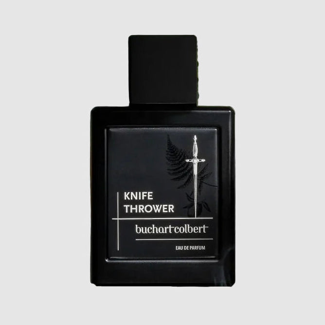Black, Buchart Colbert, 50ml perfume bottle labeled 'Knife Thrower' on a light gray background