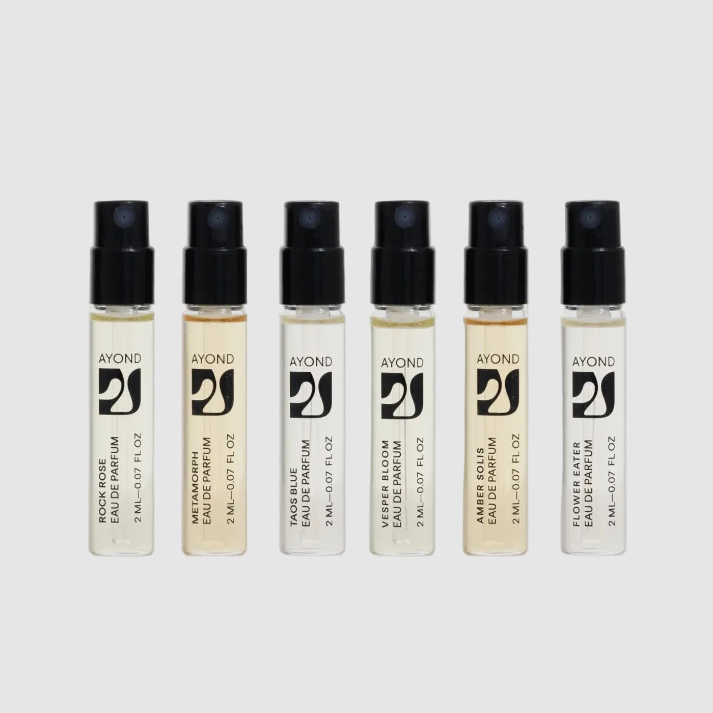 Set of six Ayond perfume bottles on a white background
