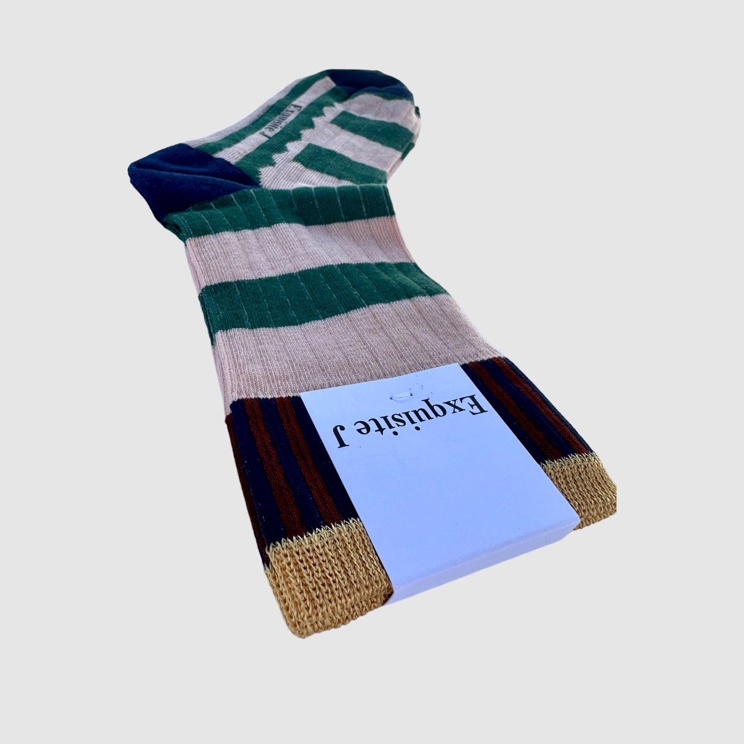 A pair of striped socks with green, pink, and blue colors, featuring royal blue toe and footbed, with the brand label 'Exquisite J' visible.