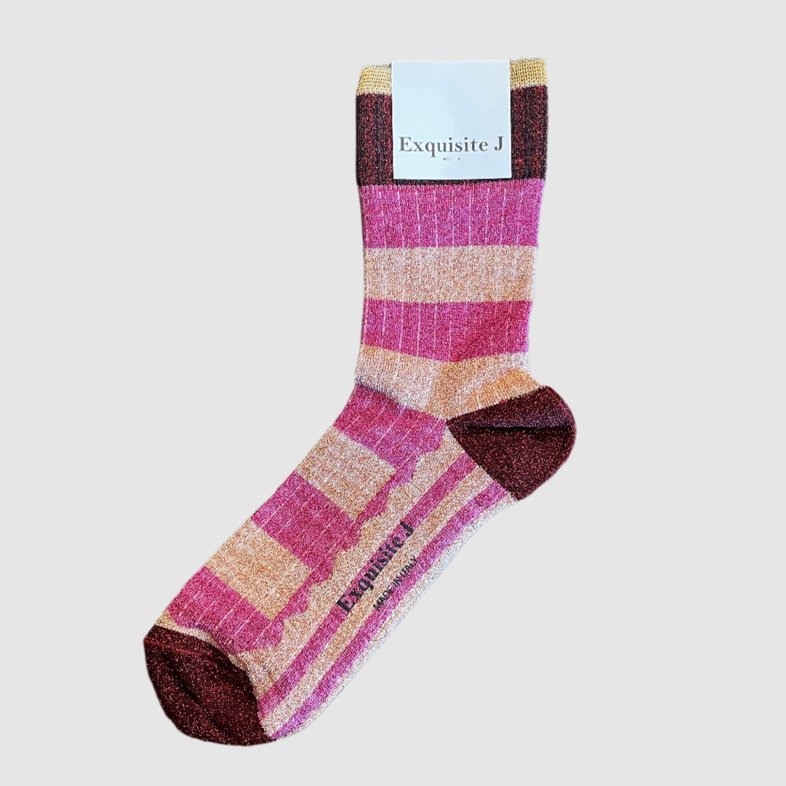 Striped sock on a light grey background with 'Exquisite J' label
