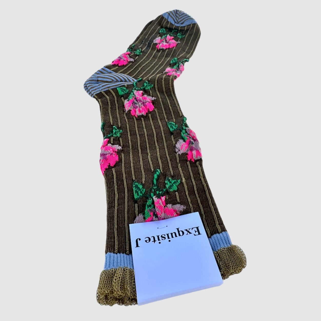 Decorative sock with floral patterns on a grey background, featuring the brand 'Exquisite J'.