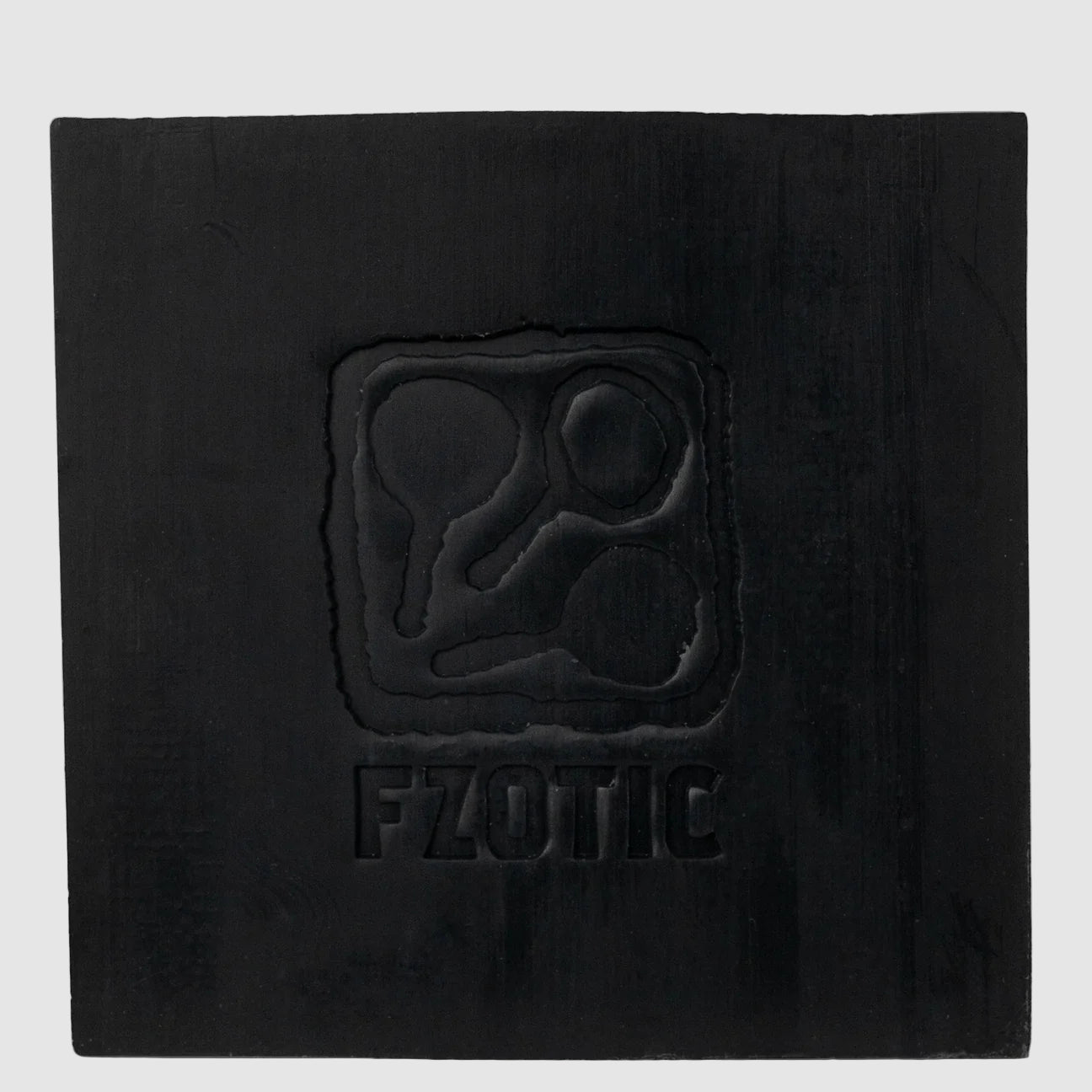 Handmade Black Suede bar Soap with FZOTIC branding on a light grey background