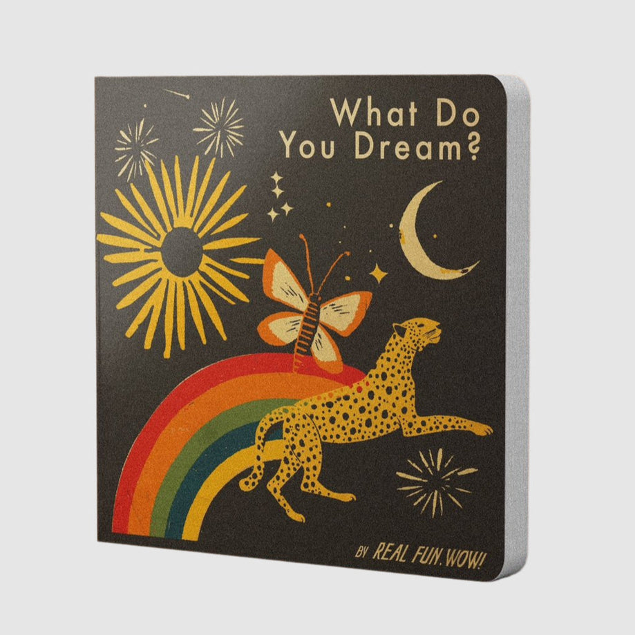 A board book with a colorful illustration of a book cover, featuring a butterfly, moon, and stars on a black background, with the title 'What Do You Dream?' by Real Fun Wow.