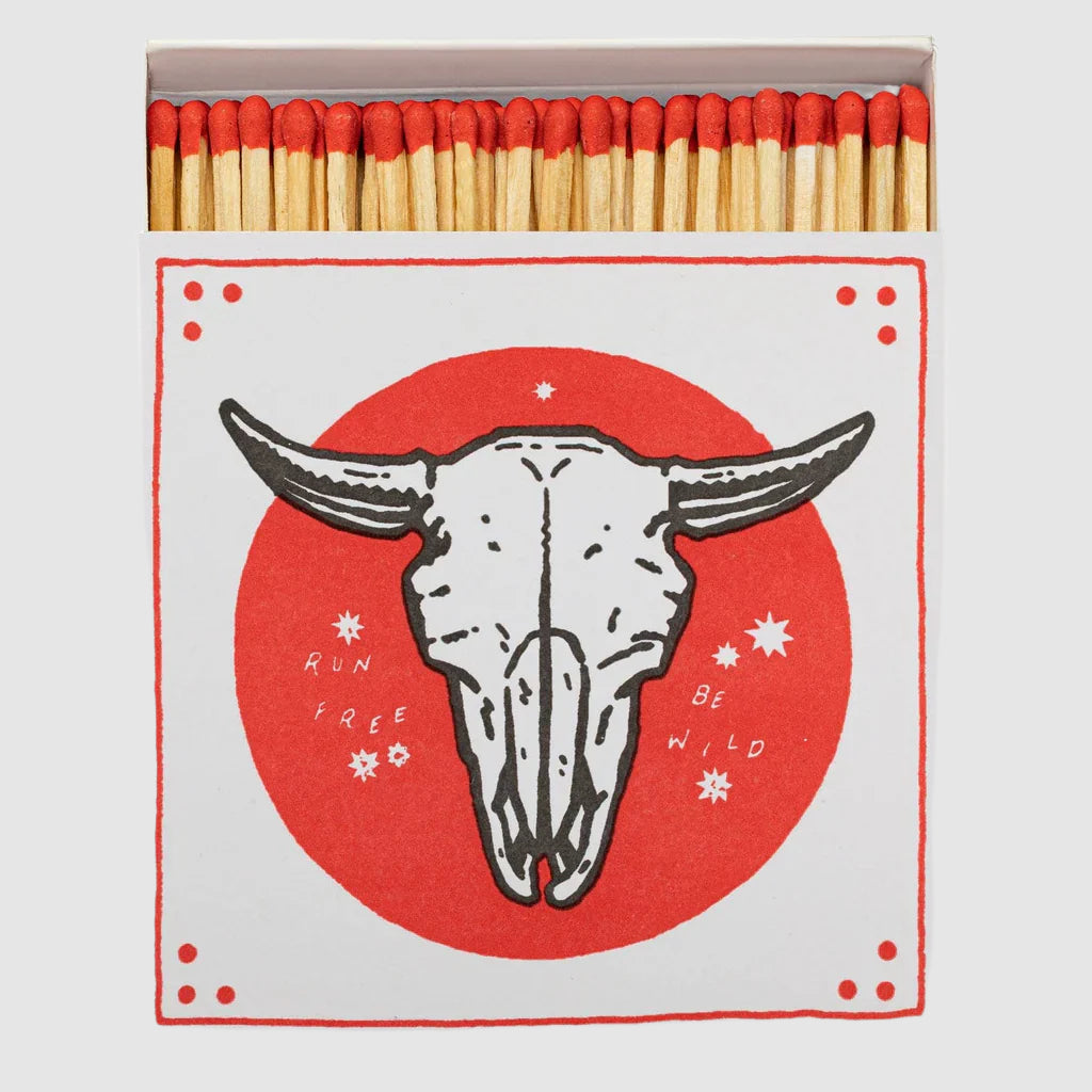 Matches with a bull skull design and text on the packaging