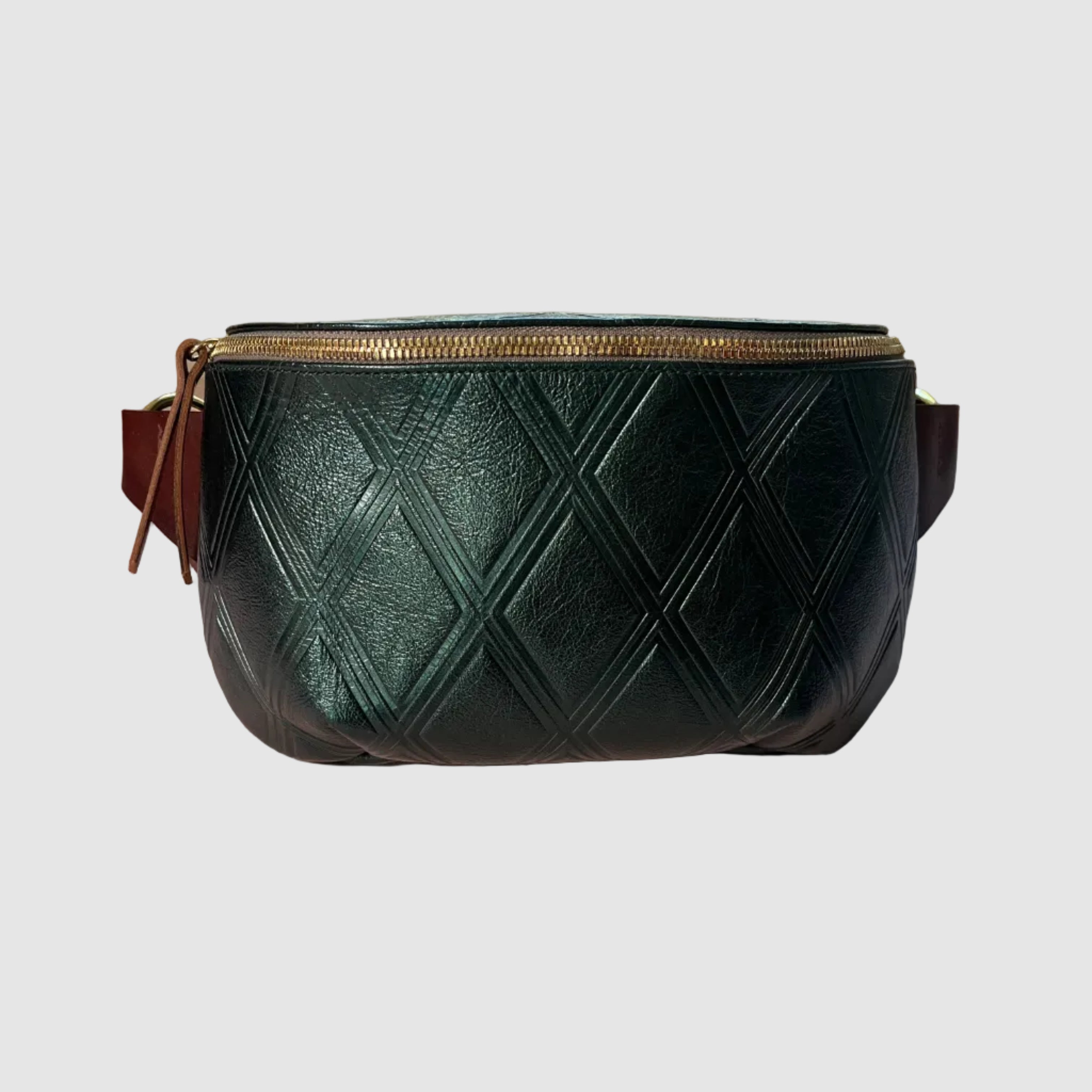 shimmering emerald green blet bag with diamond embossing and burgundy leather crossbody strap brass rings attach the belt to the bag