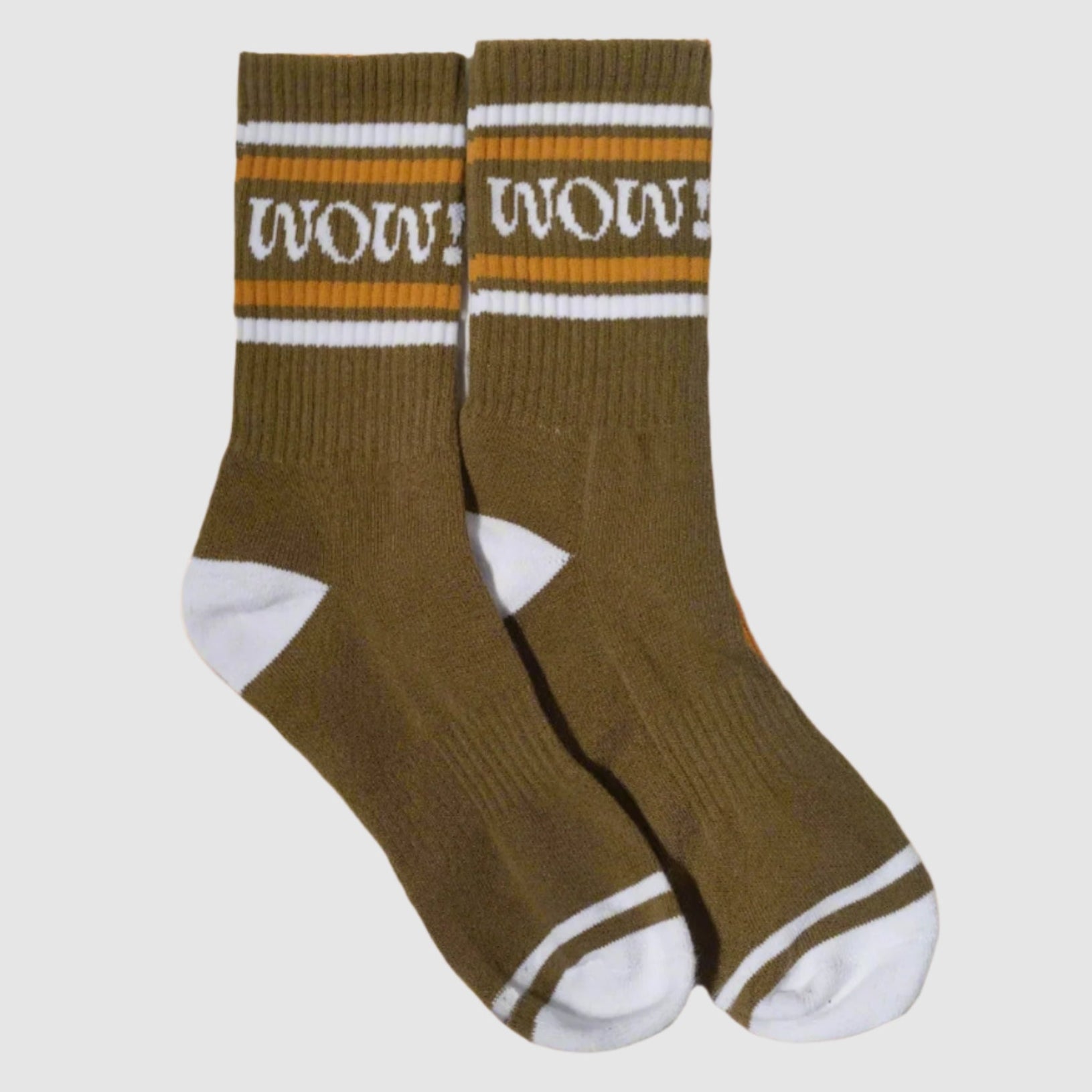 A pair of green socks with a white decorative design on the top and white ribbing at the ankle reading "wow!"