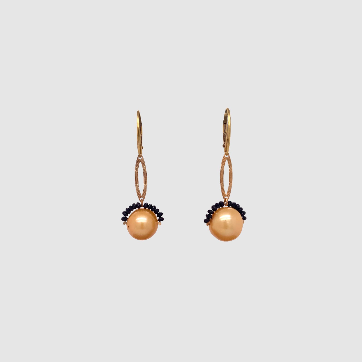 NOISE CANCELING PEARL EARRINGS // WATCH CHAIN // SPINEL