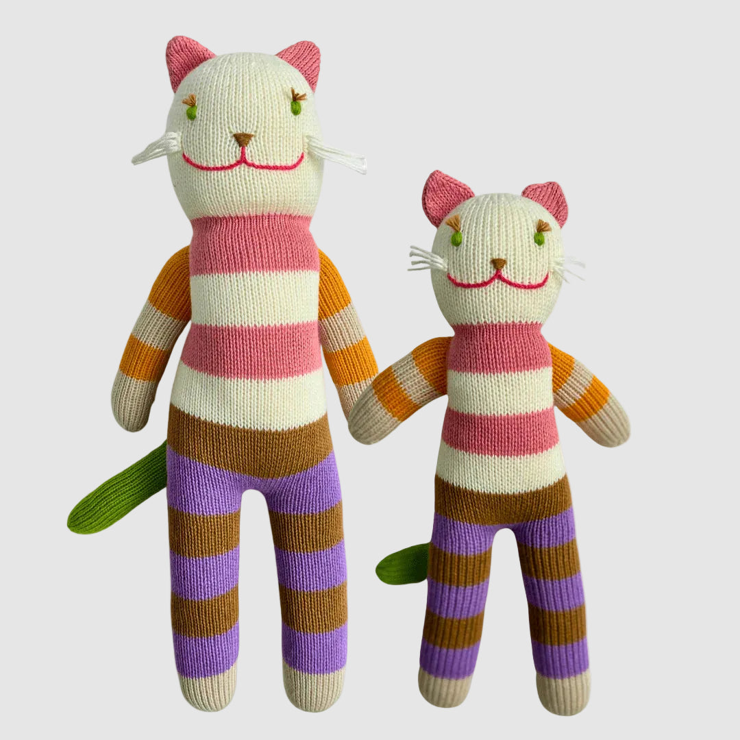 Two striped cat toys on a white background