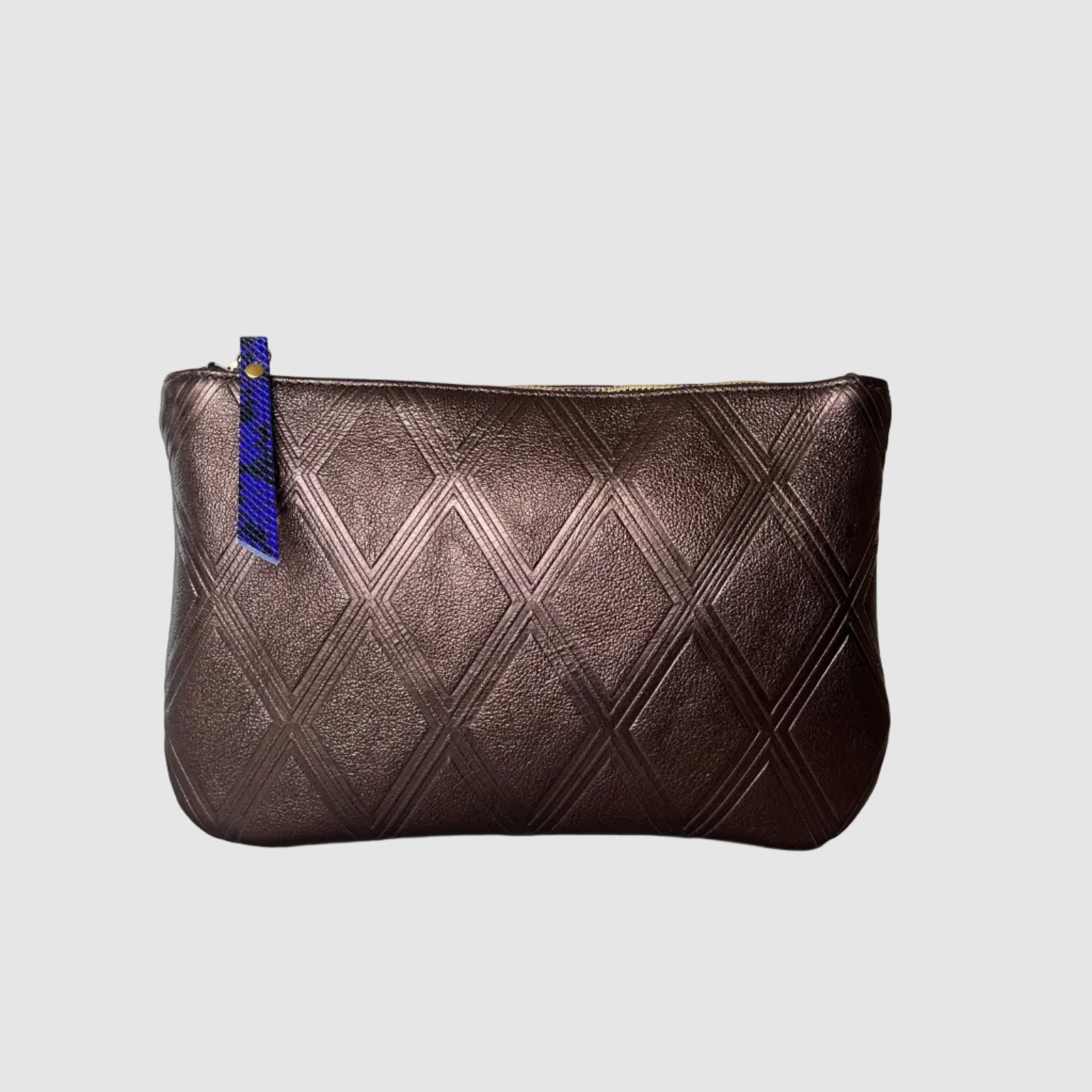 Medium sized clutch mellow dawn embossed diamond patterns quilted vibe independent hand made boutique