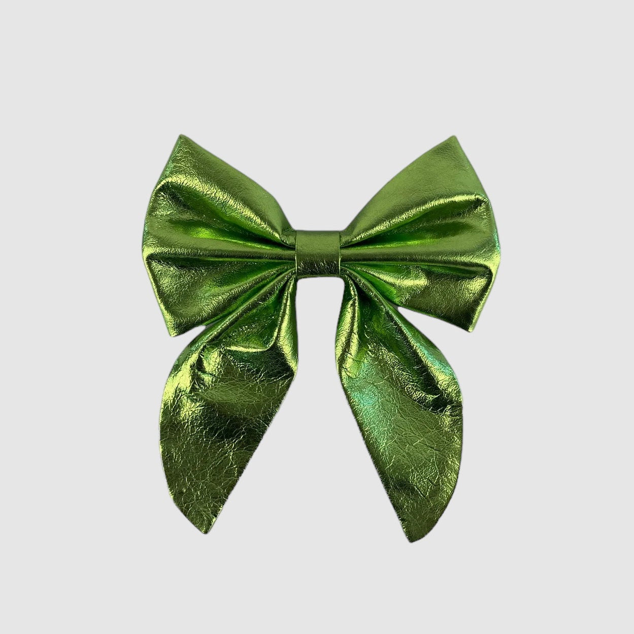 A metallic green neck bow with a small brass buckle closure.