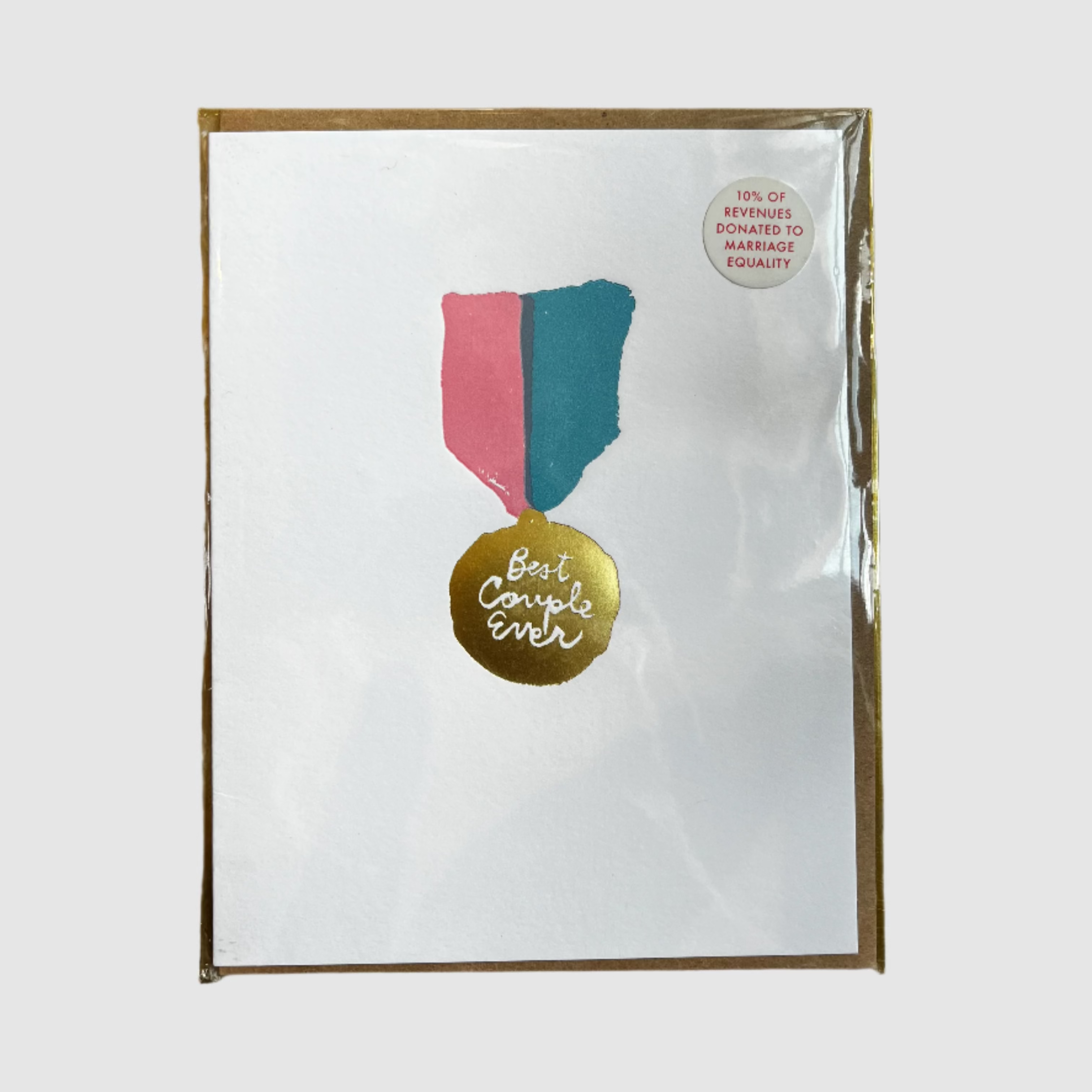 Packaged card with colorful design and 'Best Couple Ever' text on a gold surface