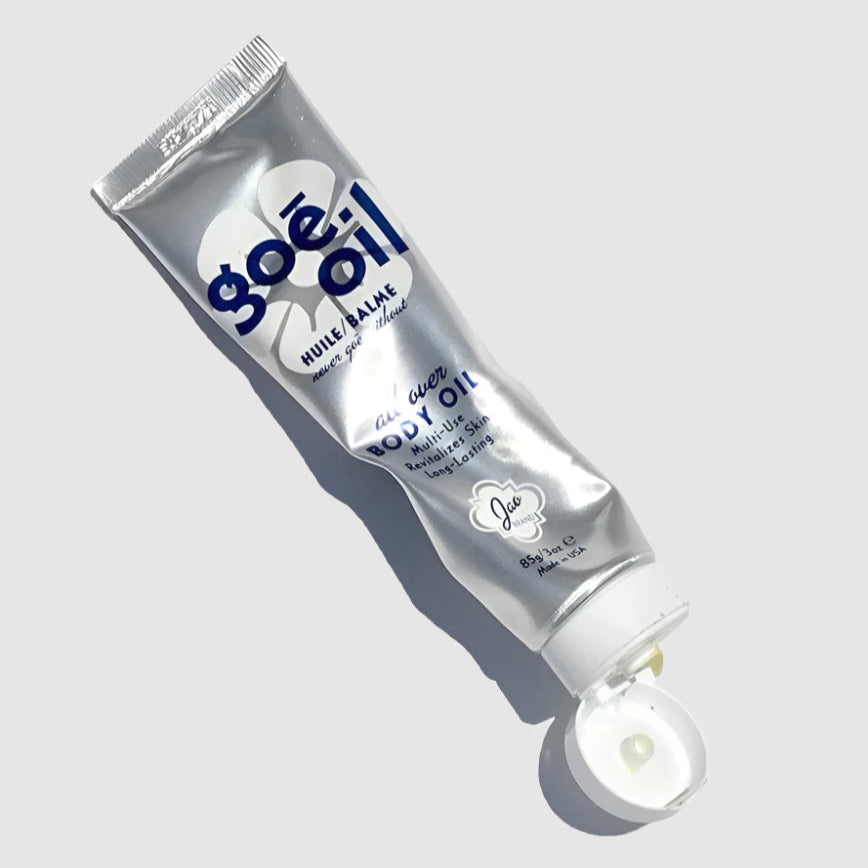 Tube of goe oil on a light gray background