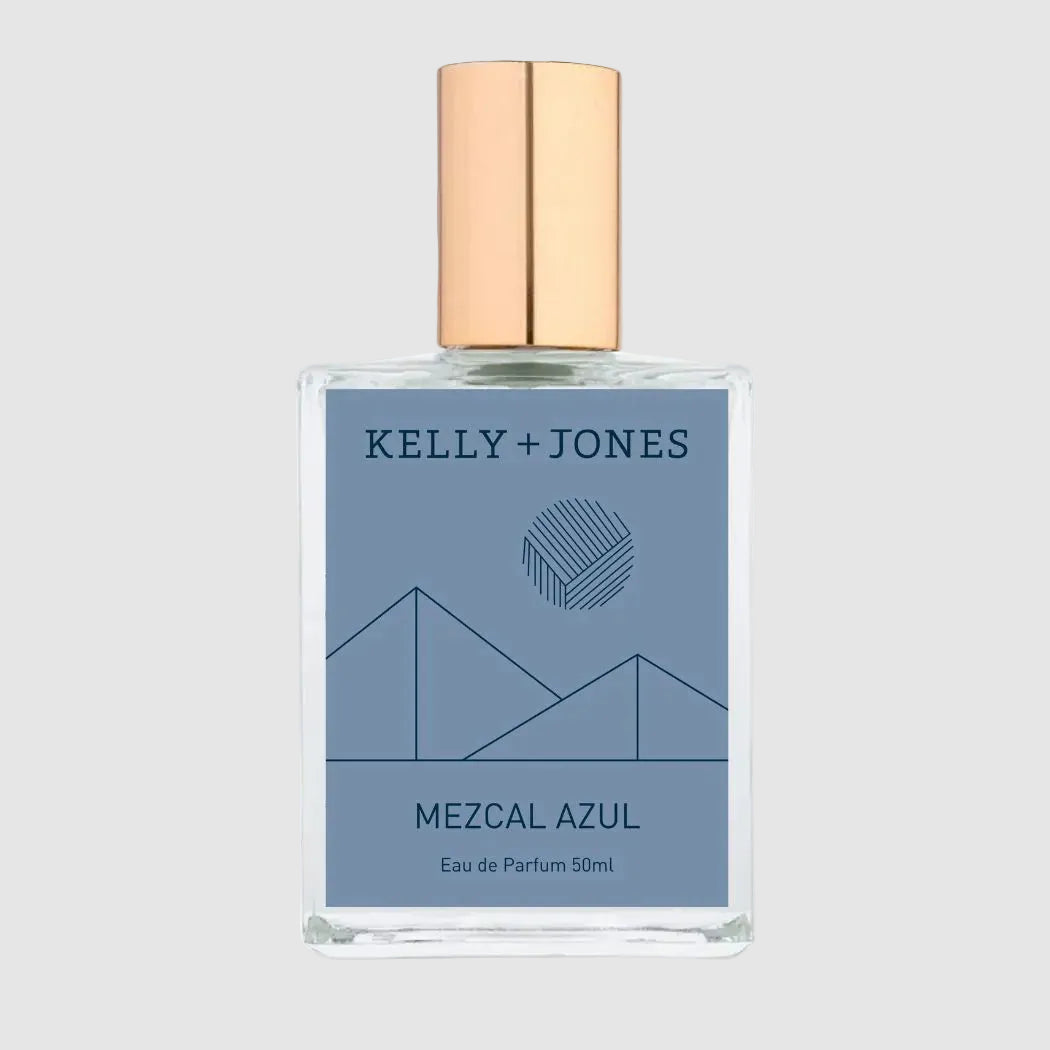 Perfume bottle labeled 'Kelly + Jones Mezcal Azul' on a light grey background