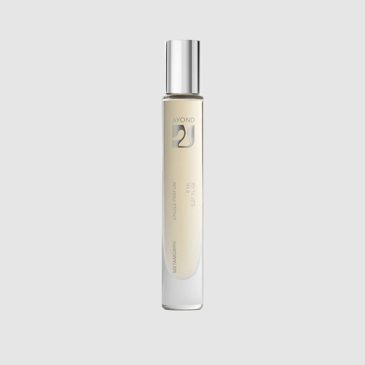 Ayond Metamorph perfume oil clear skinny bottle on a light grey background