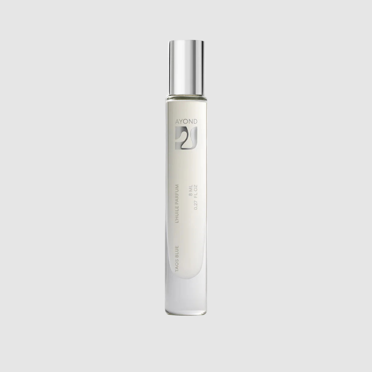 Ayond's Taos Blue perfume oil skinny tube glass bottle on a light grey background