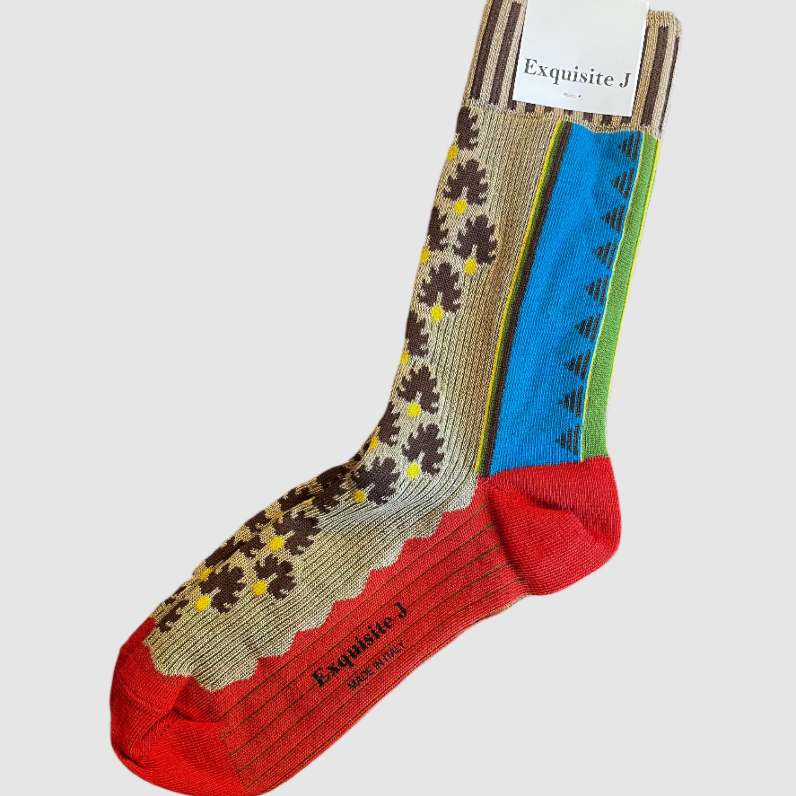 Set of colorful socks with a brand label on a light gray background