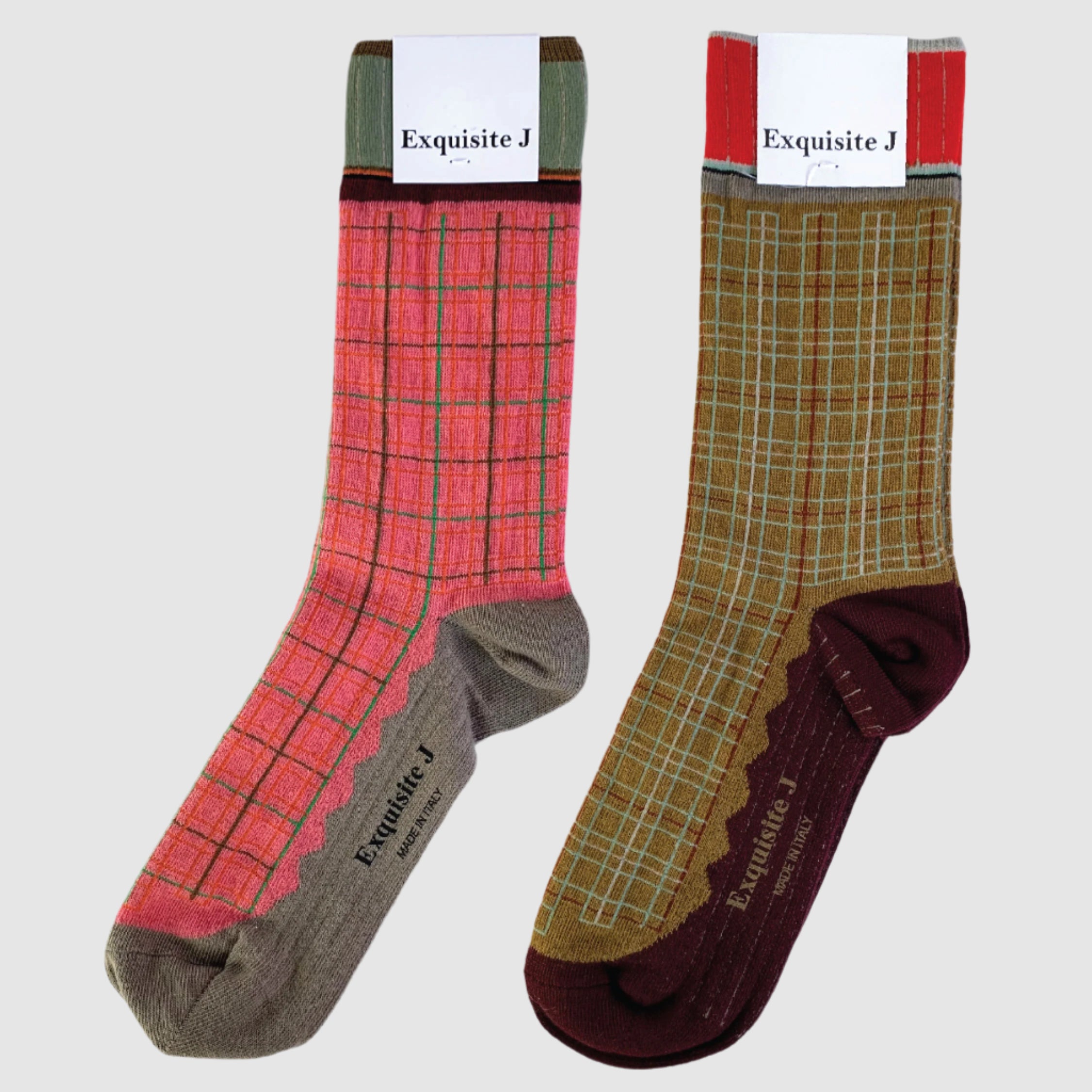 Two pairs of plaid socks with 'Exquisite J' labels on a light gray background