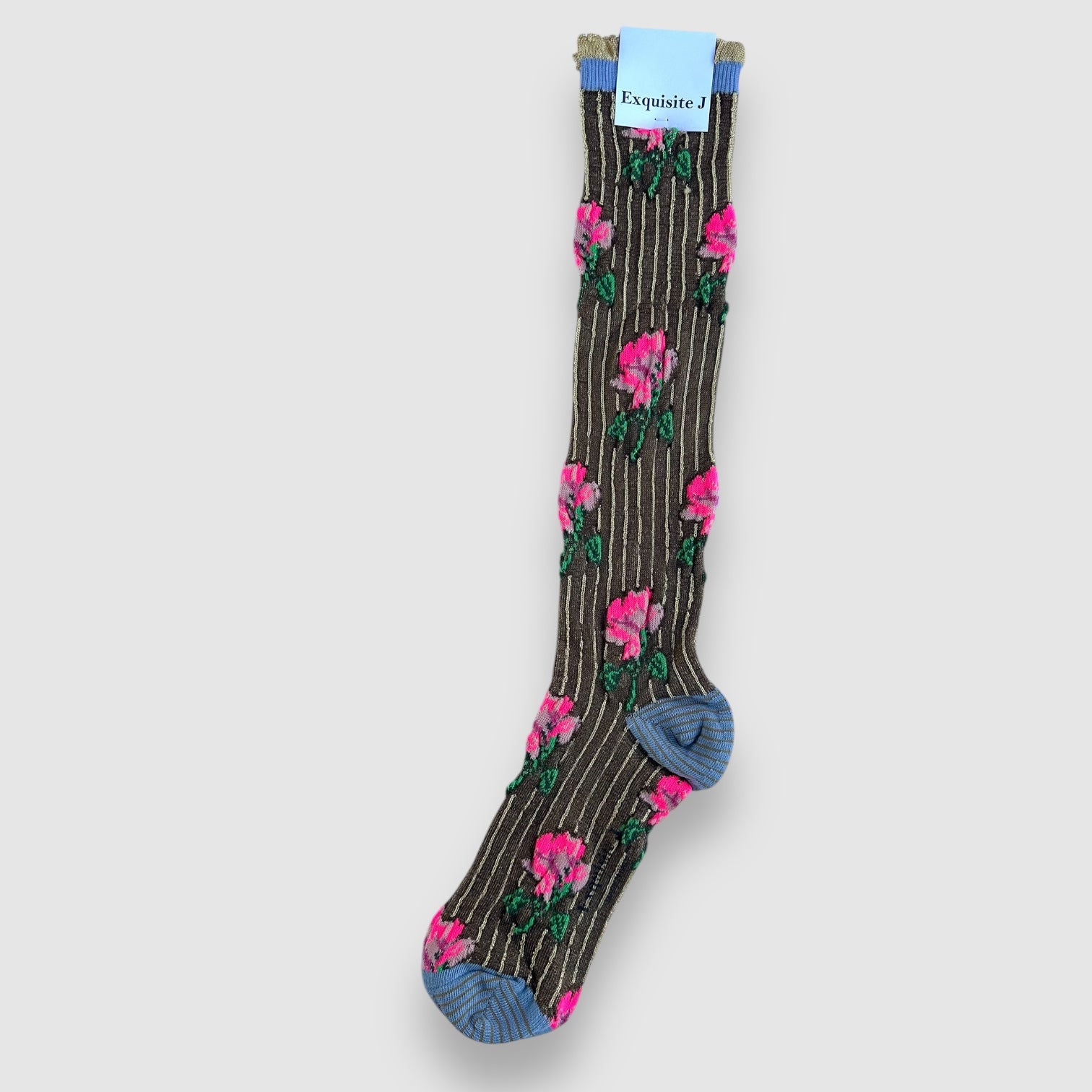 Knee-high striped socks with pink floral pattern and a blue accent at the cuff.