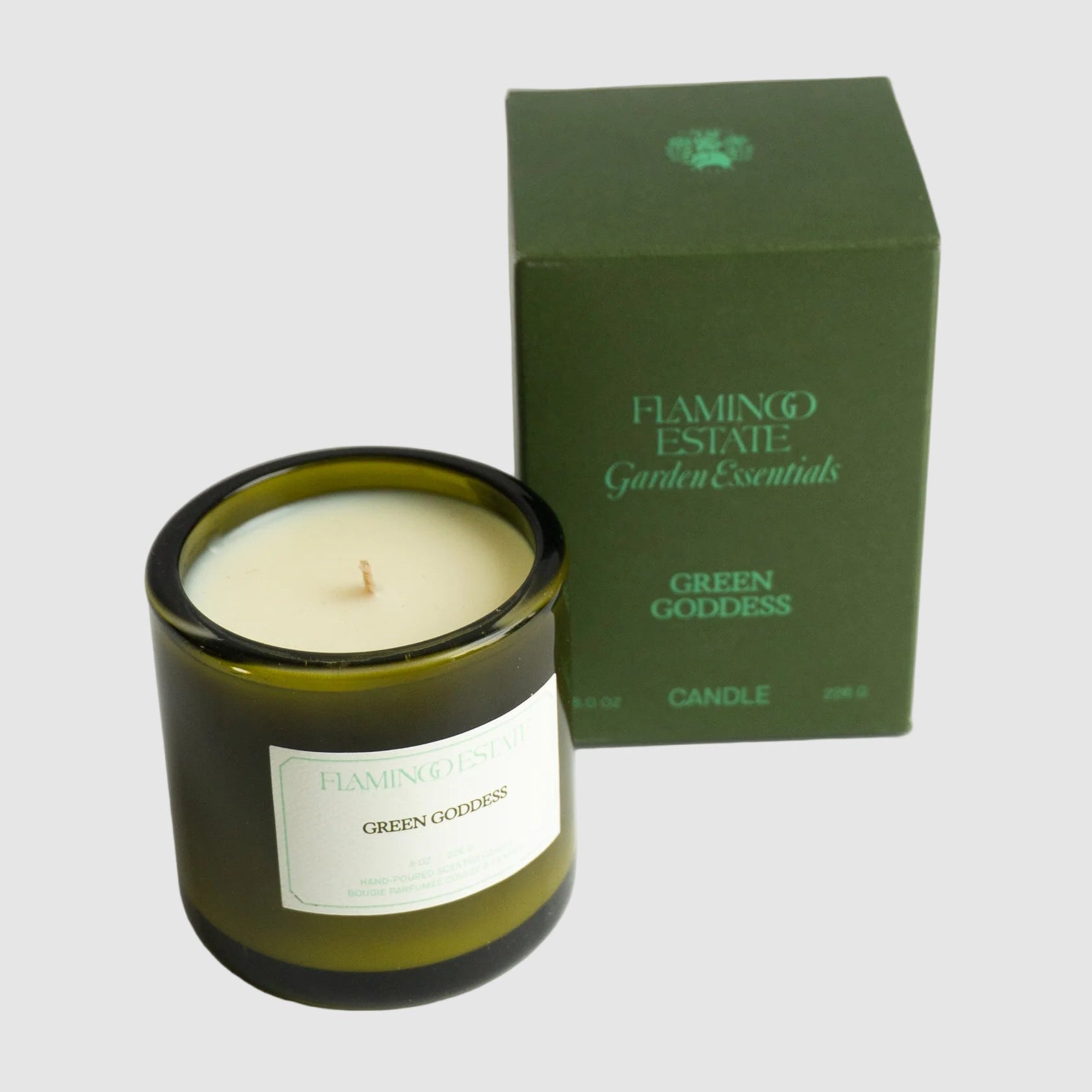 Flamingo Estate Green Goddess candle and packaging on a white background