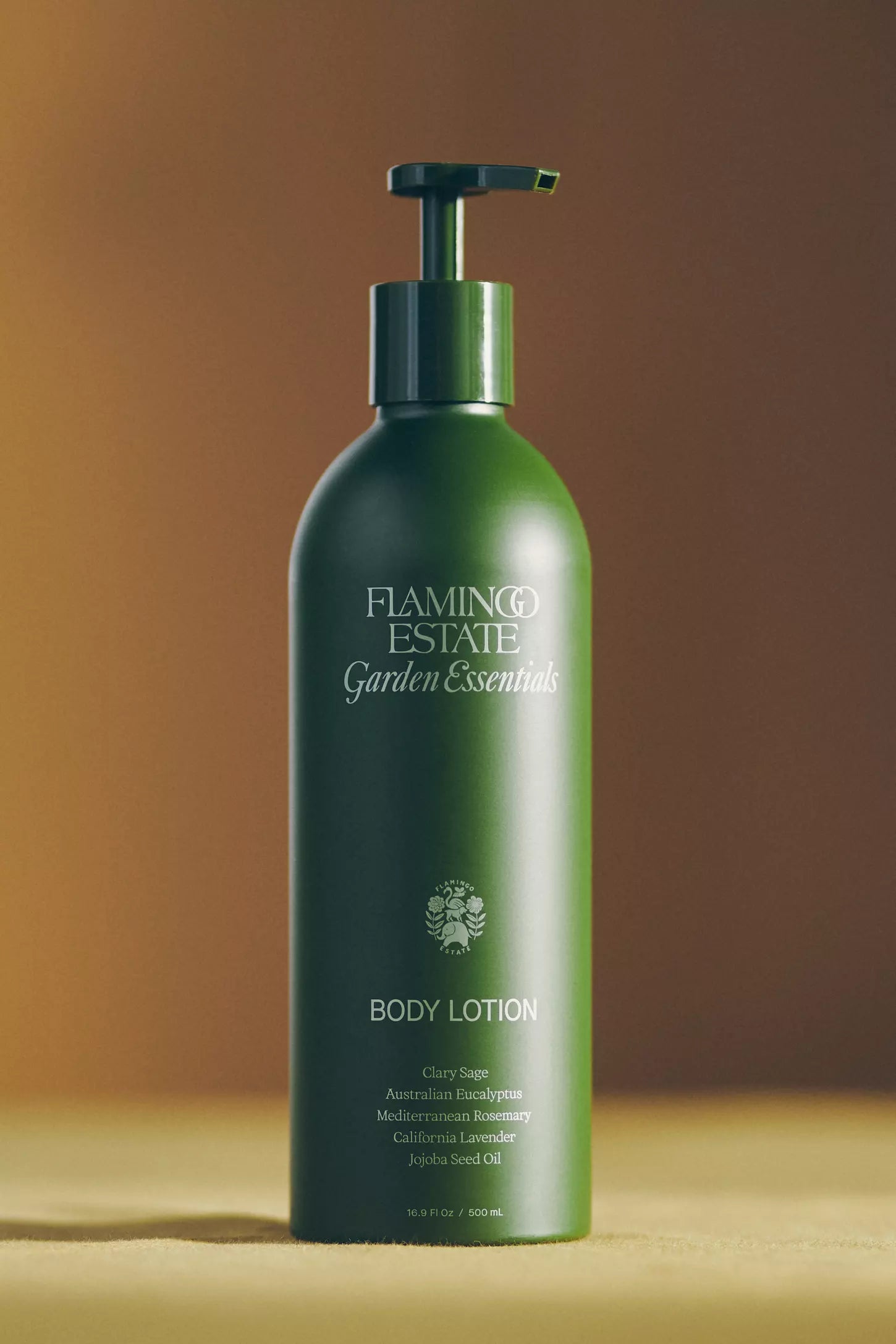 Green body lotion bottle with pump on a brown background