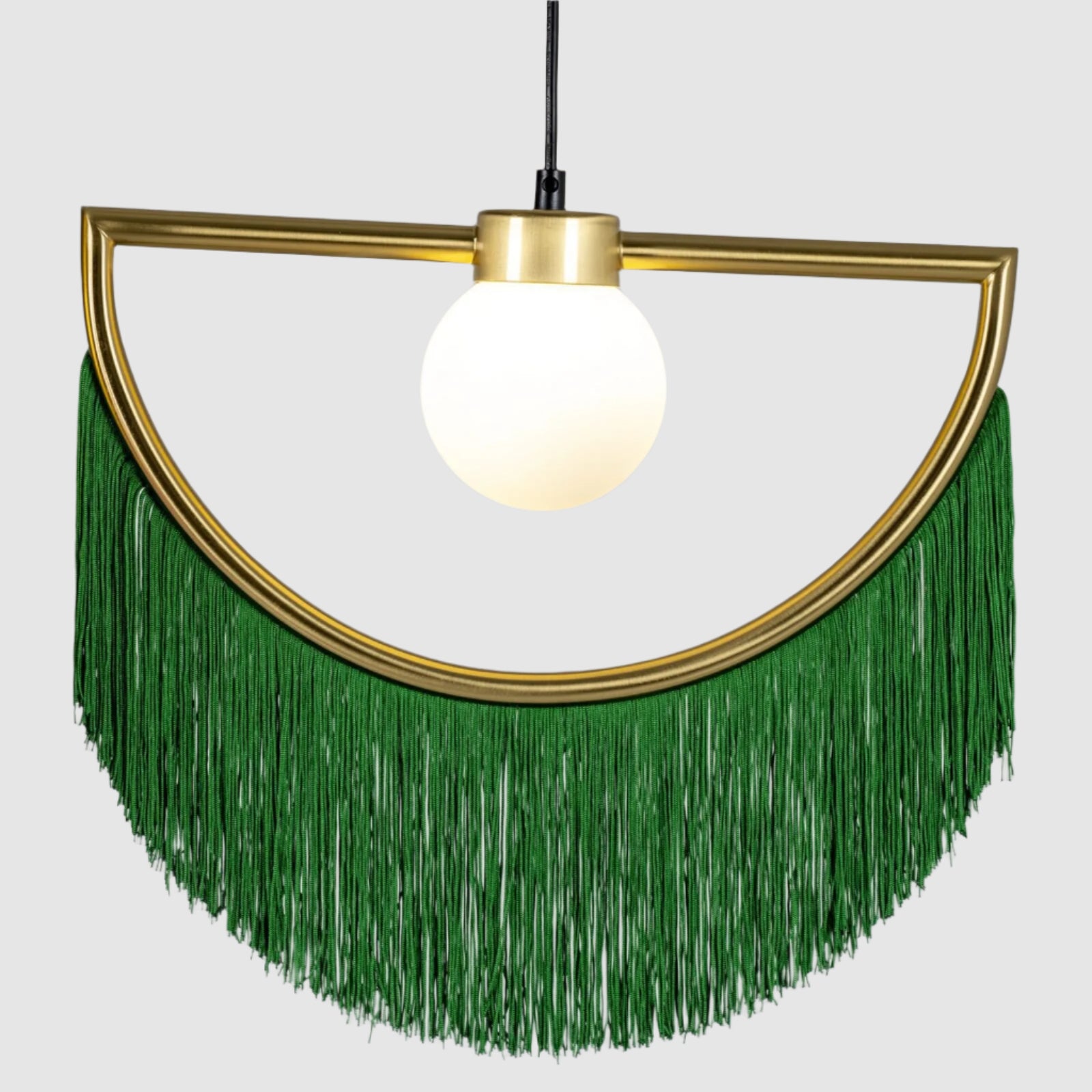 Pendant light with gold frame and green fringe on a gray background