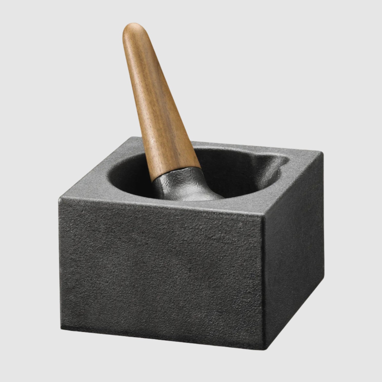 Mortar and pestle set on a beige background