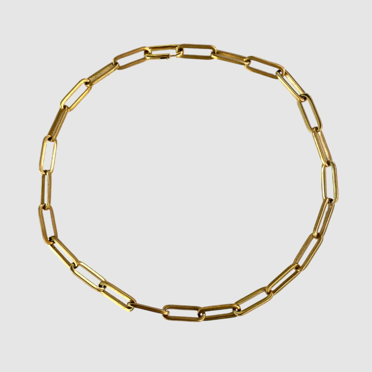 (e6e6e6 background. FULL NECKLACE PHOTO, focal point selected) short description of necklace including materials, length, clasp type etc then "on a light grey background". Then - - this necklace is designed and handmade in Tucson, Arizona by Sofie Albertsen / Tasha Bundy