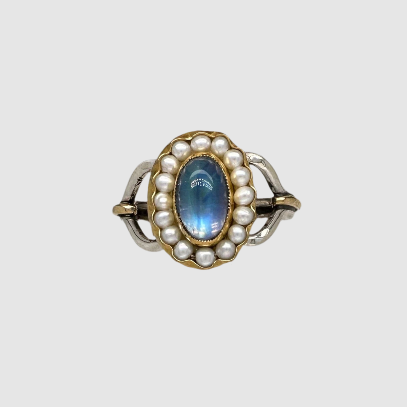 (e6e6e6 background. focal point selected) short description of ring including materials, gemstones, size, etc then "on a light grey background". Then - - this ring is designed and handmade in Tucson, Arizona by Sofie Albertsen / Tasha Bundy