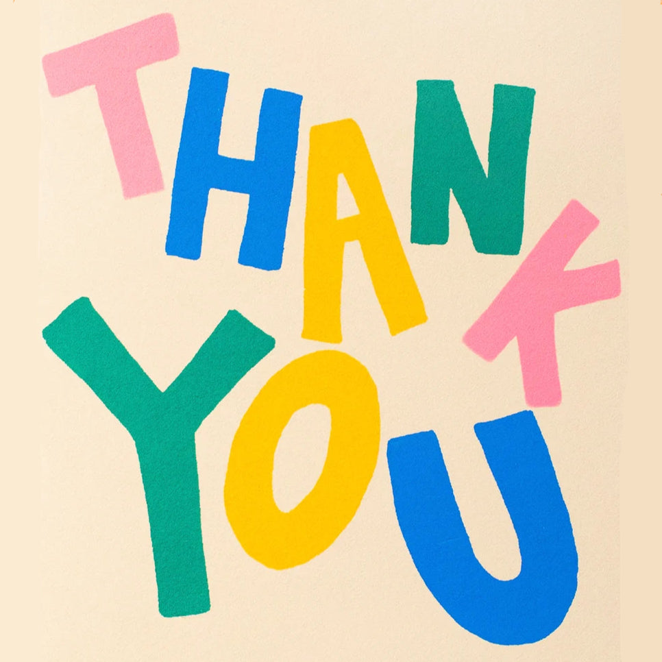 Colorful 'THANK YOU' text on a light tan greeting card. handmade, screenprinted in USA.