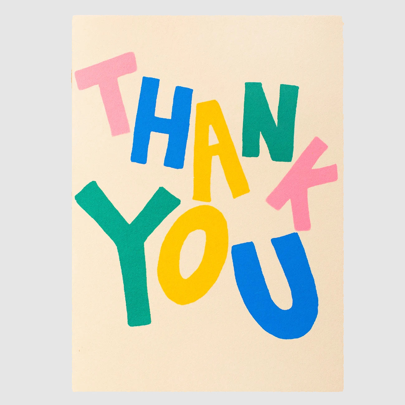 Colorful 'THANK YOU' text on a beige background