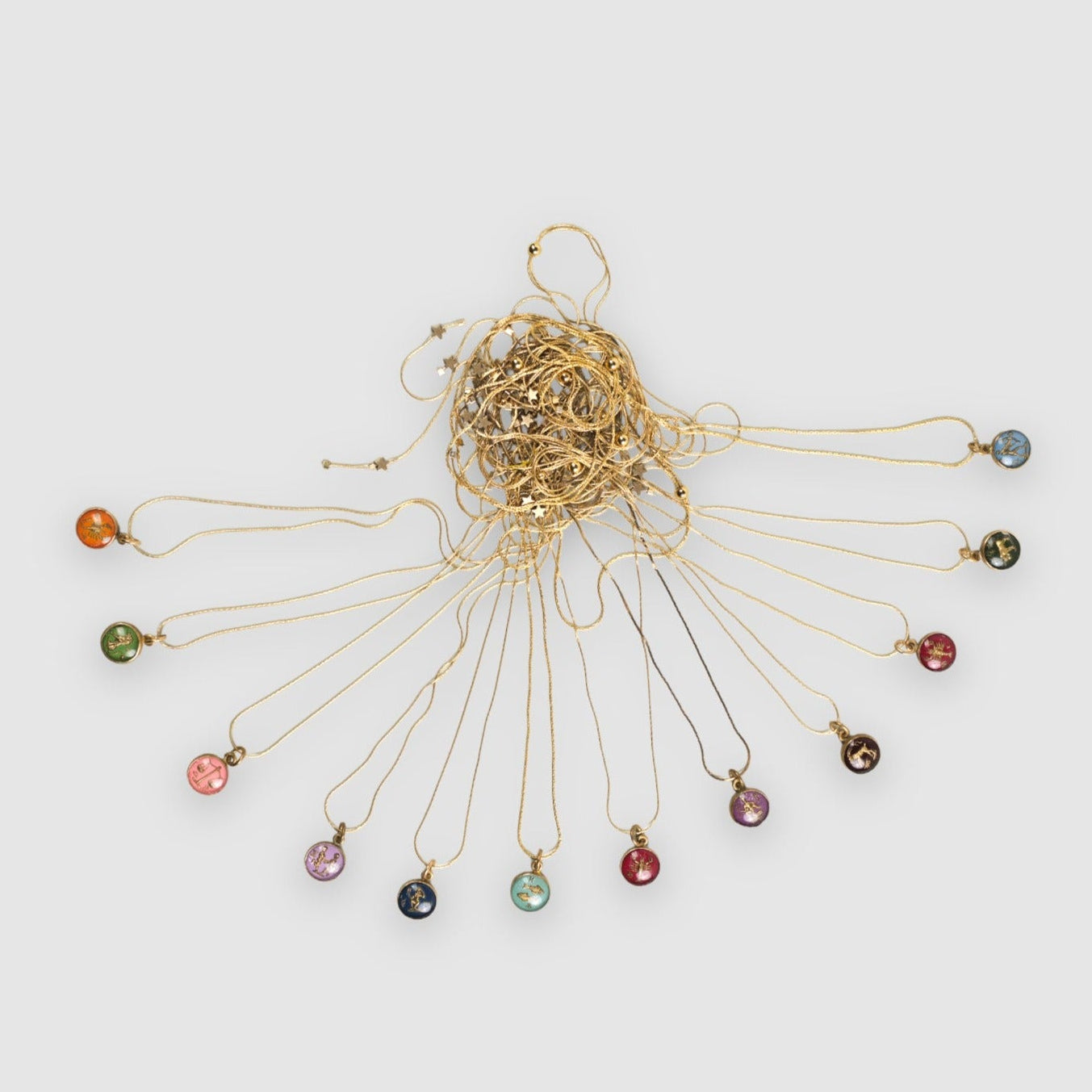 Full set of 'In The Stars' Astrological necklaces handmade by Tasha Bundy featuring Aries, Taurus, Gemini, Cancer, Leo, Virgo, Libra, Scorpio, Sagittarius, Capricorn, Aquarius, and Pisces. 