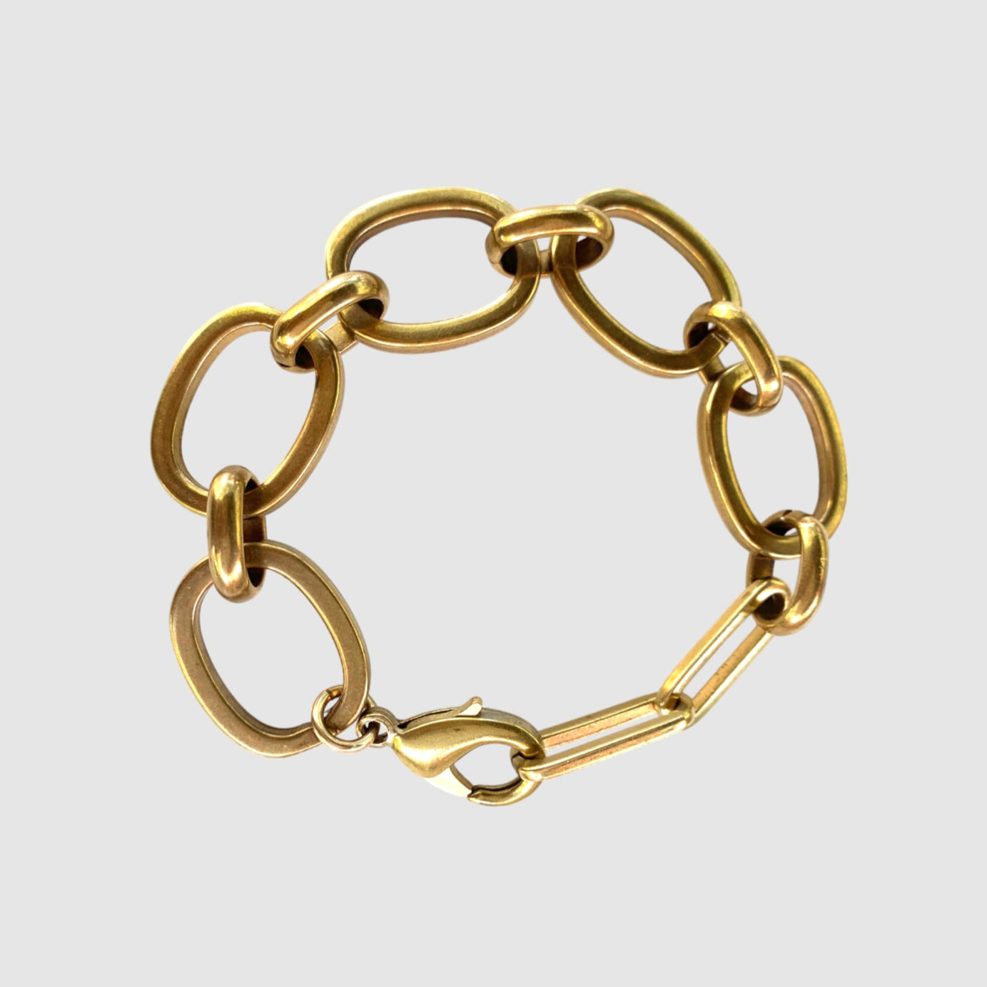 (e6e6e6 background. BRACELET PLAIN VIEW, focal point selected) short description of bracelet including materials, length, clasp type etc then "on a light grey background". Then - - this bracelet is designed and handmade in Tucson, Arizona by Sofie Albertsen / Tasha Bundy